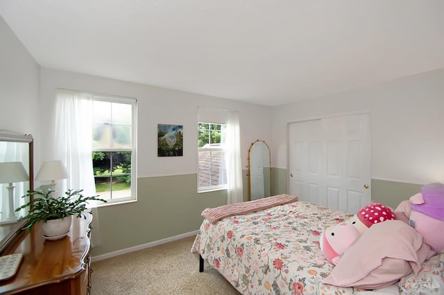 6711 Bayberry Ct, Hamilton Twp, OH 45039 - carpeted bedroom featuring baseboards and a closet