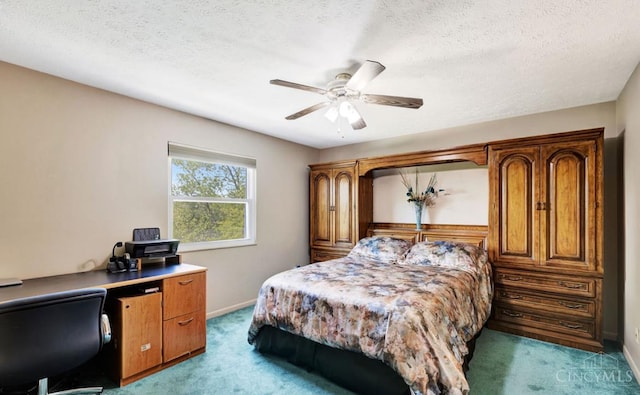 5817 Countryview Ter, Delhi Twp, OH 45233 - carpeted bedroom featuring a textured ceiling, a desk, and ceiling fan