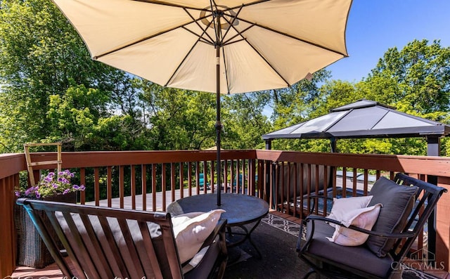 5817 Countryview Ter, Delhi Twp, OH 45233 - wooden deck featuring a gazebo and outdoor dining space