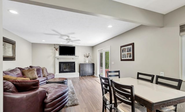 5817 Countryview Ter, Delhi Twp, OH 45233 - living area with recessed lighting, a fireplace, light wood-style floors, and ceiling fan