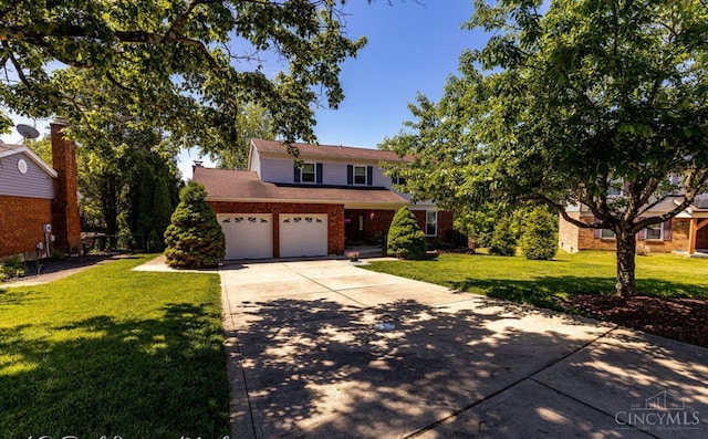 5817 Countryview Ter, Delhi Twp, OH 45233 - traditional-style house featuring a front lawn, concrete driveway, and brick siding