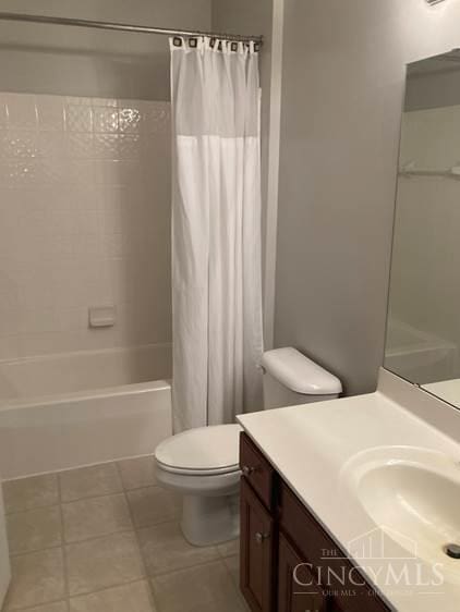 9530 Greenery Ct, Deerfield Twp, OH 45140 - bathroom with vanity, shower / bath combination with curtain, and tile patterned flooring