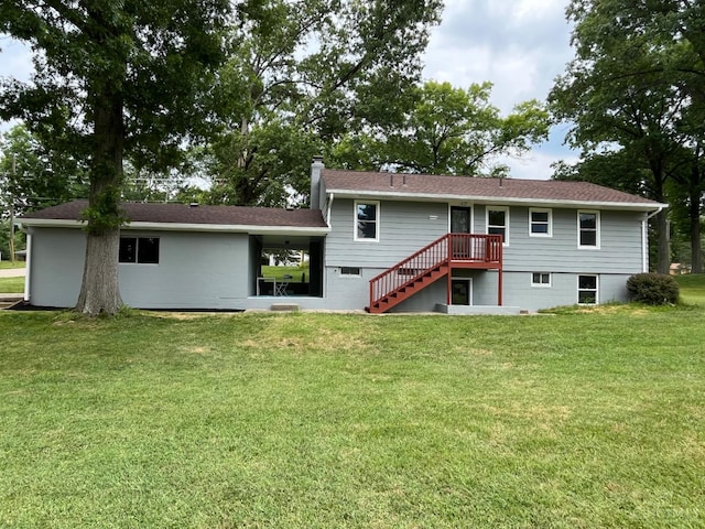 2035 Miles Rd, Cincinnati, OH 45231 - rear view of property featuring a yard and stairway
