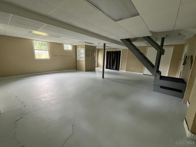 2035 Miles Rd, Cincinnati, OH 45231 - basement with a paneled ceiling and stairs