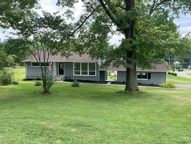 2035 Miles Rd, Cincinnati, OH 45231 - single story home featuring a front yard and roof with shingles