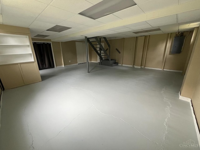2035 Miles Rd, Cincinnati, OH 45231 - finished basement with electric panel, a drop ceiling, and stairs