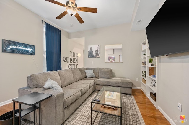 2711 Price Ave, Cincinnati, OH 45204 - living room featuring ceiling fan and light wood-type flooring