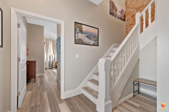 2711 Price Ave, Cincinnati, OH 45204 - stairway with wood finished floors and baseboards