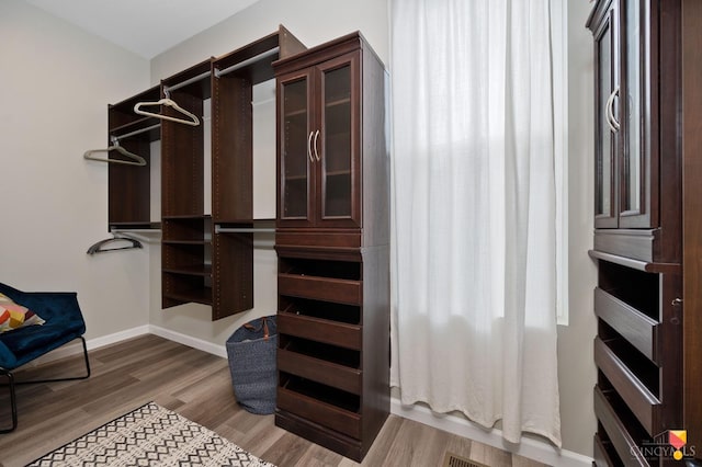 2711 Price Ave, Cincinnati, OH 45204 - walk in closet with wood finished floors