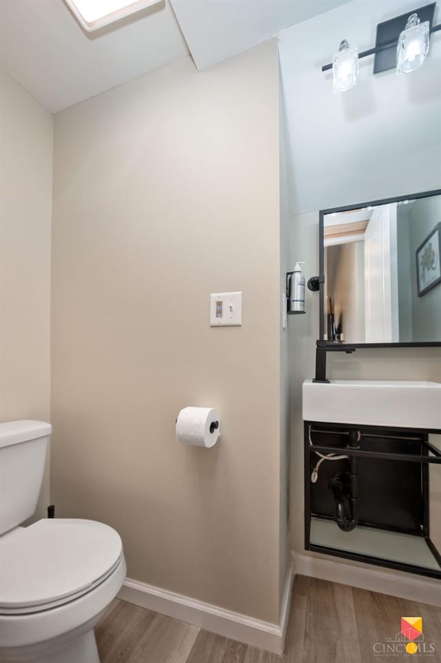 2711 Price Ave, Cincinnati, OH 45204 - bathroom featuring wood finished floors and vanity