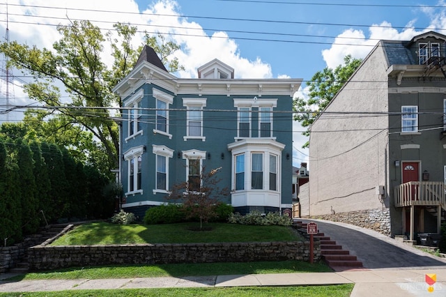 2711 Price Ave, Cincinnati, OH 45204 - italianate-style house with a front lawn and stairway