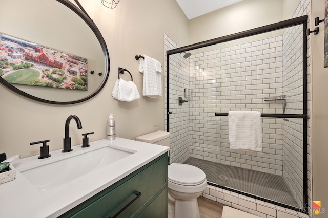 2711 Price Ave, Cincinnati, OH 45204 - full bathroom featuring a shower stall, vanity, and wood finished floors