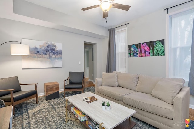 2711 Price Ave, Cincinnati, OH 45204 - living room with a ceiling fan and baseboards