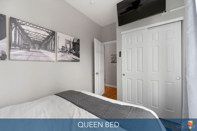 2711 Price Ave, Cincinnati, OH 45204 - bedroom with wood finished floors and a closet