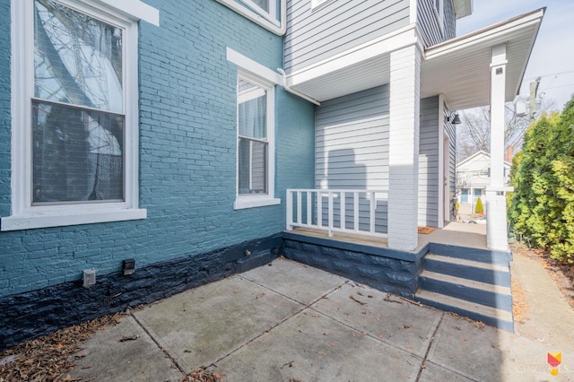 2711 Price Ave, Cincinnati, OH 45204 - view of side of property featuring a porch and brick siding