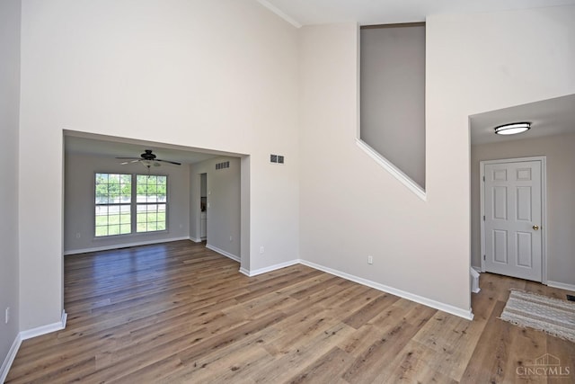 1055 Valley Wood Dr, Union Twp, OH 45103 - entrance foyer with wood finished floors, ceiling fan, and a high ceiling