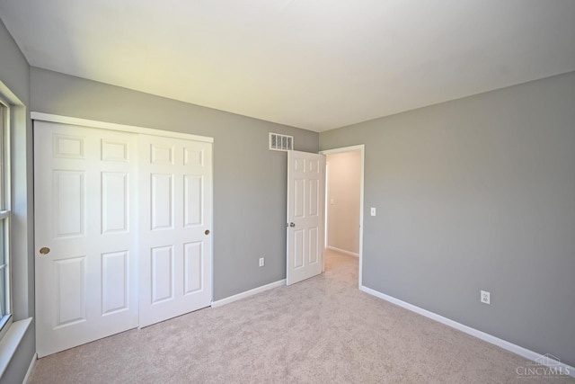 1055 Valley Wood Dr, Union Twp, OH 45103 - unfurnished bedroom featuring a closet and carpet