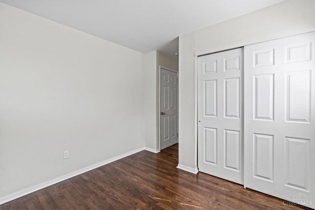 2016 Mistyhill Dr, Springfield Twp, OH 45240 - unfurnished bedroom featuring dark wood-style floors and a closet