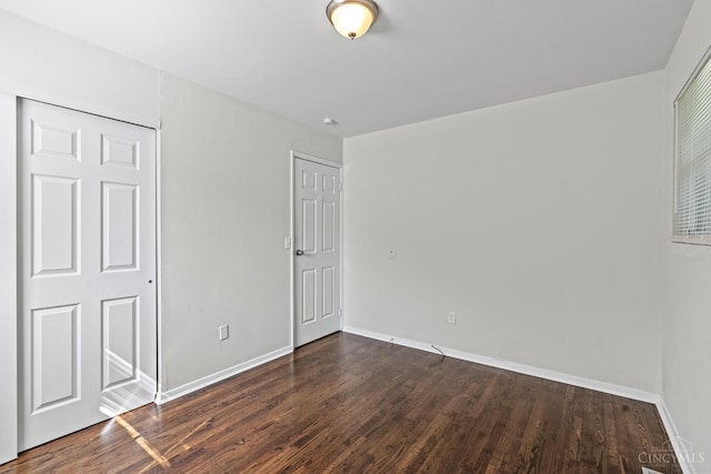 2016 Mistyhill Dr, Springfield Twp, OH 45240 - unfurnished bedroom with dark wood-style flooring and baseboards