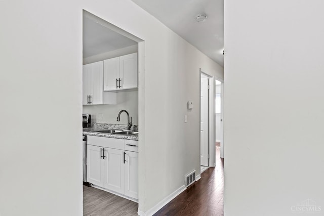 2016 Mistyhill Dr, Springfield Twp, OH 45240 - kitchen with wood finished floors and white cabinetry