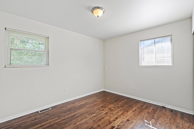 2016 Mistyhill Dr, Springfield Twp, OH 45240 - empty room with plenty of natural light and dark wood-style flooring