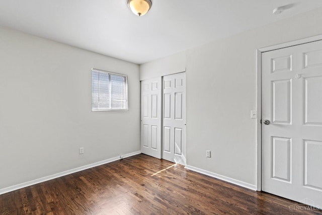 2016 Mistyhill Dr, Springfield Twp, OH 45240 - unfurnished bedroom with dark wood finished floors and a closet