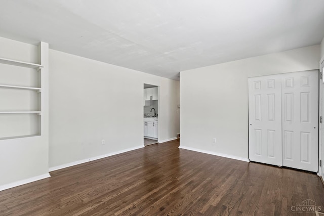 2016 Mistyhill Dr, Springfield Twp, OH 45240 - empty room with dark wood-style flooring and a sink