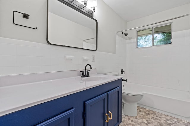 2016 Mistyhill Dr, Springfield Twp, OH 45240 - bathroom featuring vanity, shower / bath combination, and tile walls