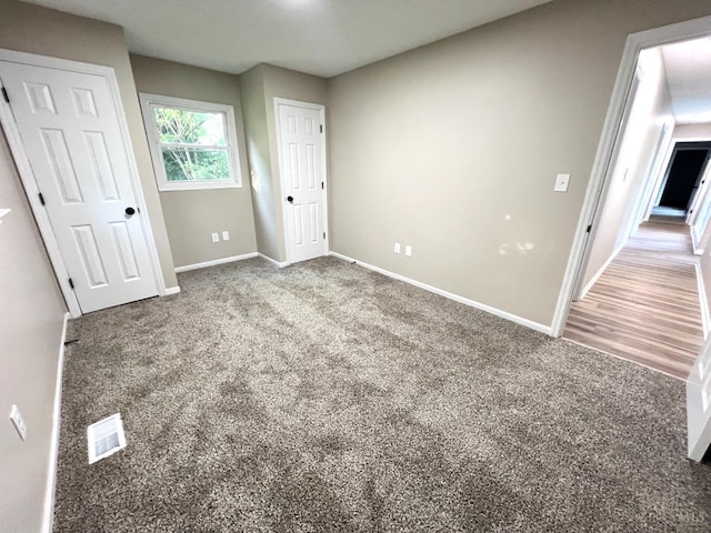 176 Lakeview Dr, Monroe, OH 45044 - unfurnished bedroom featuring carpet flooring and baseboards