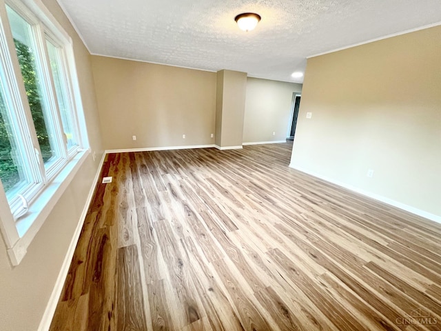 176 Lakeview Dr, Monroe, OH 45044 - empty room featuring wood finished floors and a textured ceiling