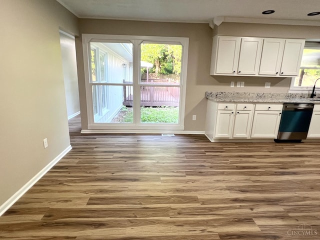 176 Lakeview Dr, Monroe, OH 45044 - kitchen with dishwashing machine, white cabinets, wood finished floors, and light stone counters