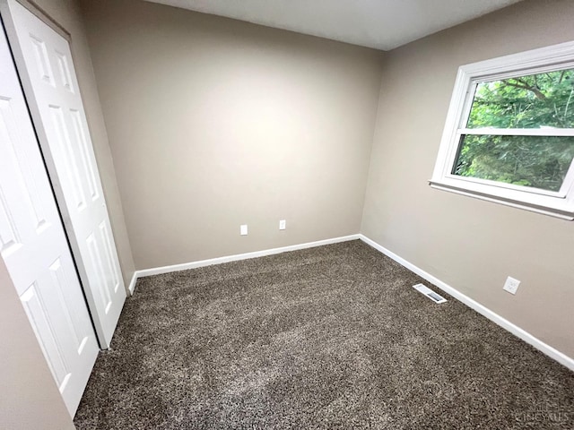 176 Lakeview Dr, Monroe, OH 45044 - unfurnished bedroom featuring carpet flooring and baseboards