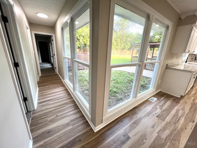 176 Lakeview Dr, Monroe, OH 45044 - corridor featuring wood finished floors and healthy amount of natural light