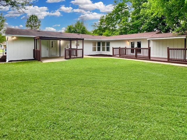 176 Lakeview Dr, Monroe, OH 45044 - back of property featuring a lawn and a patio