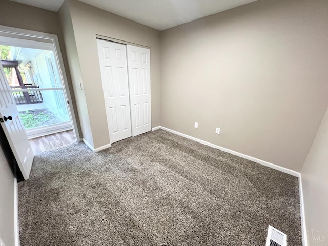 176 Lakeview Dr, Monroe, OH 45044 - unfurnished bedroom featuring carpet flooring and a closet