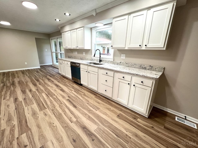 176 Lakeview Dr, Monroe, OH 45044 - kitchen with dishwasher, light wood-style flooring, white cabinetry, recessed lighting, and light stone countertops