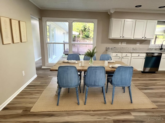 176 Lakeview Dr, Monroe, OH 45044 - dining area with wood finished floors and crown molding