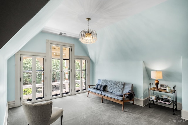 2153 Sinton Ave, Cincinnati, OH 45206 - carpeted living area with a chandelier, vaulted ceiling, and french doors