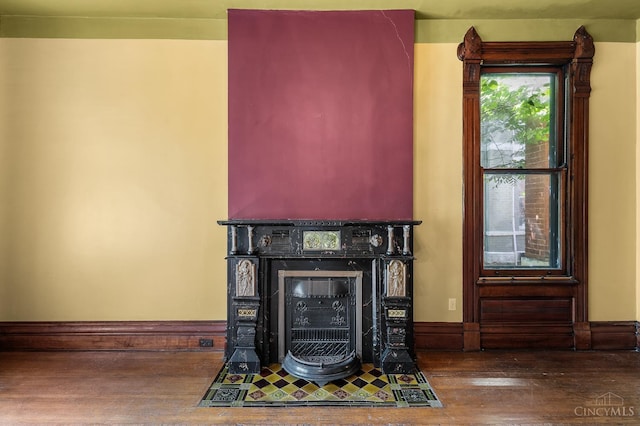 2153 Sinton Ave, Cincinnati, OH 45206 - detailed view of wood finished floors and a fireplace with flush hearth