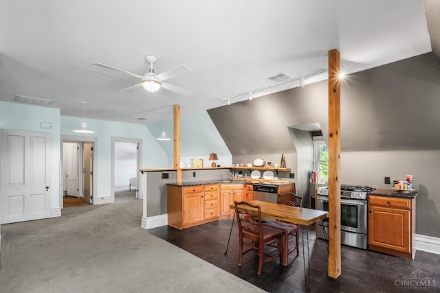 2153 Sinton Ave, Cincinnati, OH 45206 - kitchen with gas range, a ceiling fan, dark countertops, vaulted ceiling, and rail lighting