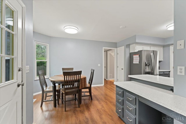 5577 Dove Ln, West Chester, OH 45069 - dining space with light wood finished floors and baseboards