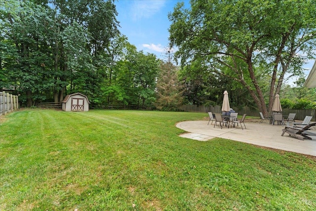 5577 Dove Ln, West Chester, OH 45069 - fenced backyard featuring a patio area and a shed