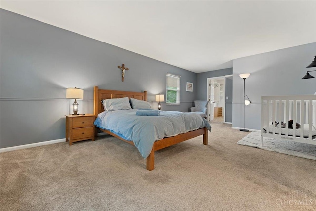 5577 Dove Ln, West Chester, OH 45069 - bedroom with light colored carpet and ensuite bath