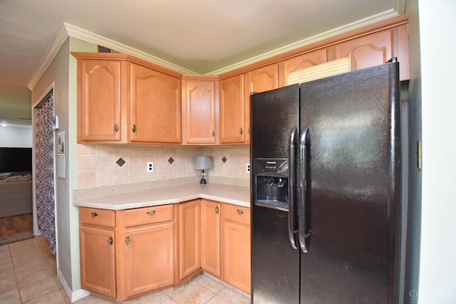 1008 Garden Ave, Middletown, OH 45044 - kitchen featuring black refrigerator with ice dispenser, light tile patterned floors, light countertops, tasteful backsplash, and crown molding