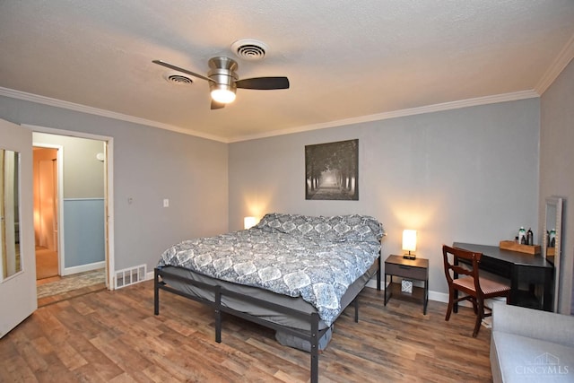 1008 Garden Ave, Middletown, OH 45044 - bedroom with wood finished floors, ornamental molding, and a ceiling fan