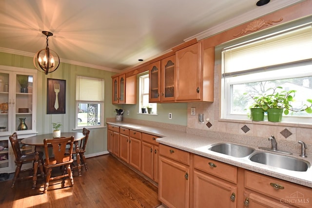 1008 Garden Ave, Middletown, OH 45044 - kitchen featuring light countertops, glass insert cabinets, decorative light fixtures, dark wood-style flooring, and a chandelier