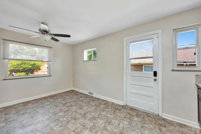 7866 Stillwell Rd, Cincinnati, OH 45237 - spare room with ceiling fan and stone finish flooring