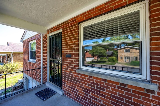 7866 Stillwell Rd, Cincinnati, OH 45237 - property entrance with brick siding and covered porch