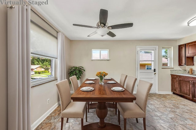 7866 Stillwell Rd, Cincinnati, OH 45237 - dining space with stone finish flooring and a ceiling fan