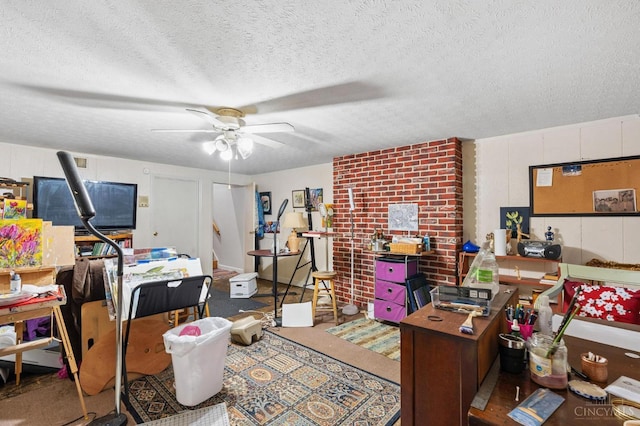 600 Kathryn Dr, Wilmington, OH 45177 - carpeted home office featuring ceiling fan and a textured ceiling
